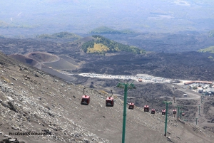 Etna trekking at 3000 meters with cable car, guide, and bookable taxi service