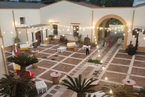 Evening tour of a historic winery and wine tasting with Sicilian cuisine