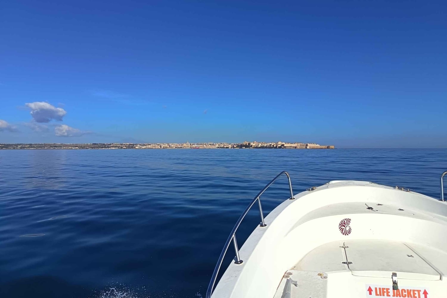 Syracuse : sortie en bateau de Noël avec « spumante et pandoro »