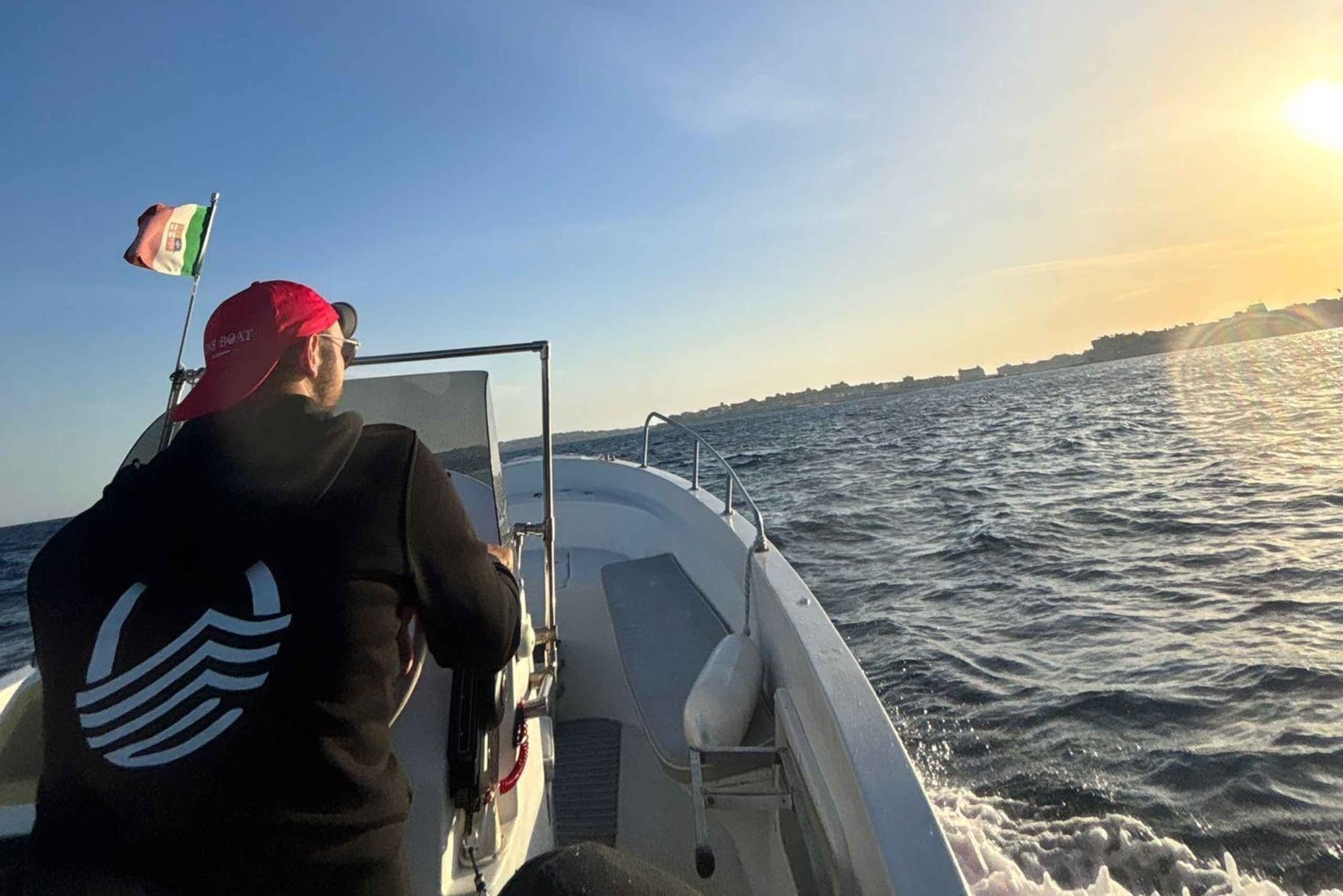 Syracuse : sortie en bateau de Noël avec « spumante et pandoro »