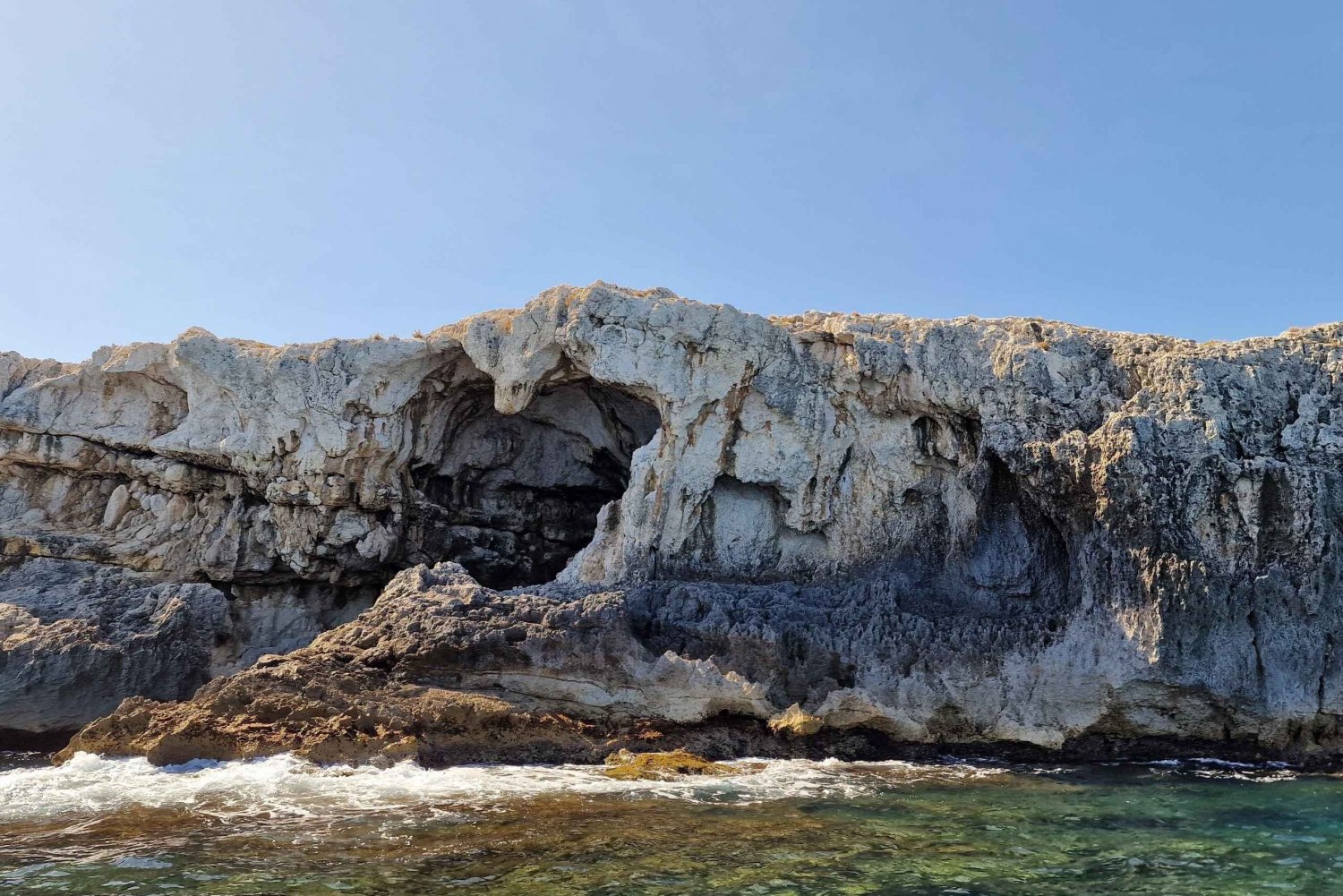 Siracusa : tour en bateau d'Ortigia et des grottes marines et apéritif au coucher du soleil