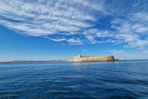 Syracuse: Pillirina, Ortigia and sea caves tour by boat