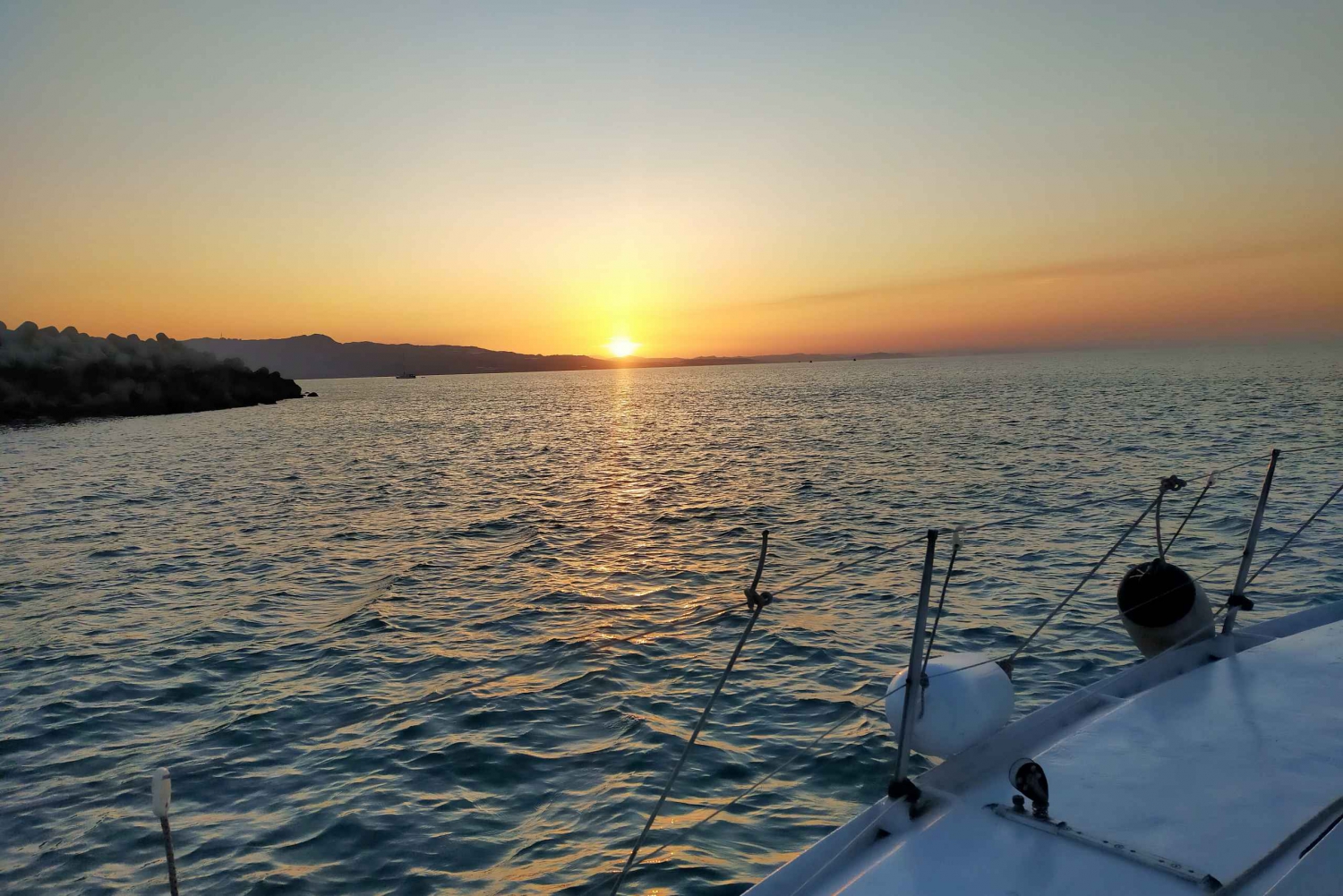 Catania: Sunset Sailboat Trip with Aperitif and Guide