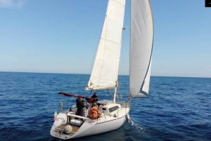 Catania: Sunset Sailboat Trip with Aperitif and Guide
