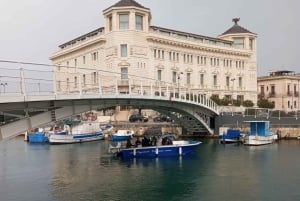 シラクサ：オルティジア島と洞窟のボートツアー（水泳の解説付き）