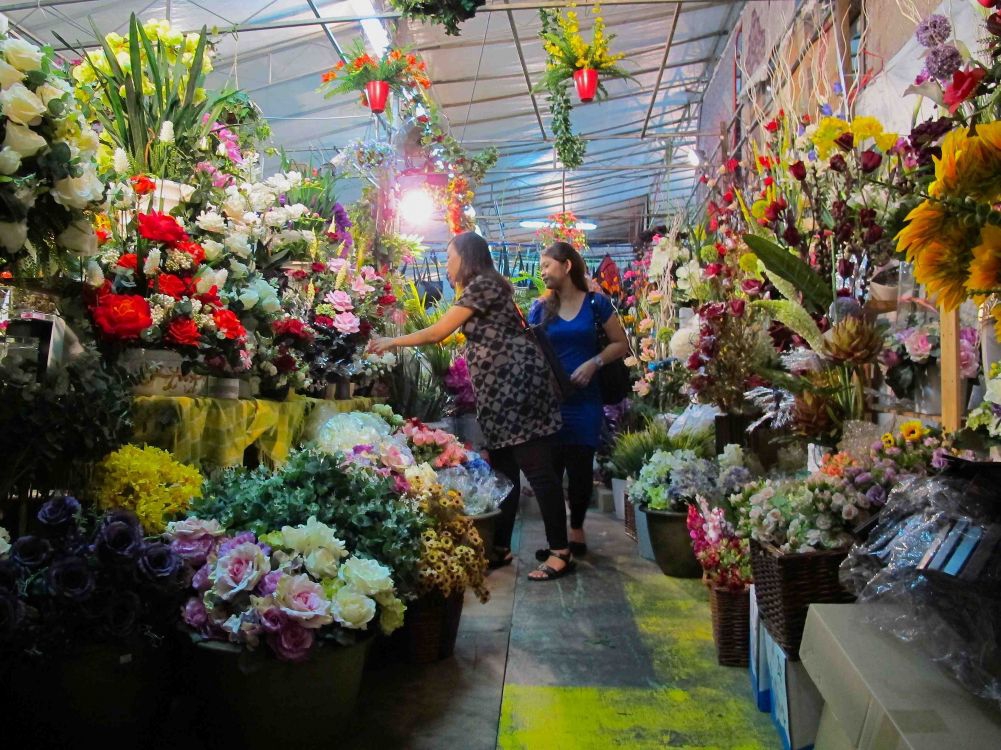 Families decorate their homes during Hari Raya and elaborate flower arrangements - both real and synthetic - are a must have.