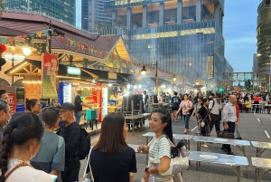 Tour nocturno con firma: Paseo por el puerto deportivo con degustación de comida