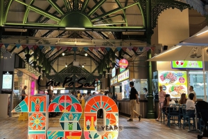 Tour nocturno con firma: Paseo por el puerto deportivo con degustación de comida