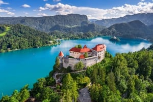 From Ljubljana: Postojna Cave and Lake Bled Group Day Trip