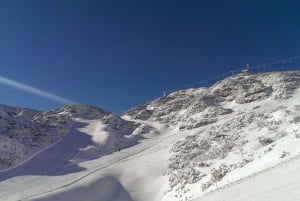 ヴォーゲル・スキーセンターでインストラクターと一緒にスノーボードをお楽しみください