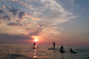 Portorož: Wycieczka na stojąco Paddleboarding wzdłuż wybrzeża o zachodzie słońca
