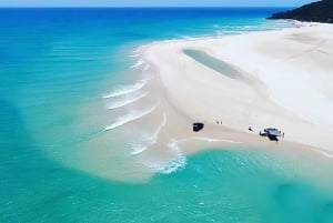 Aprenda a surfear en el recorrido por la playa y las olas más largas de Australia