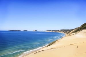 Aprenda a surfear en el recorrido por la playa y las olas más largas de Australia