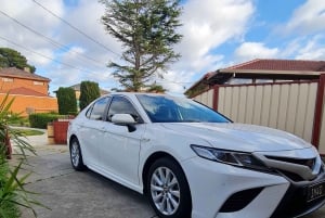 Sydney: Serviços de táxi do aeroporto / traslado particular