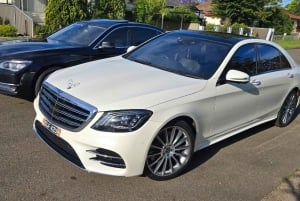 Sydney: Flughafentransfer zum Stadtzentrum von Sydney (mit Chauffeur)