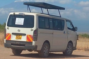 DAY TRIP AMBOSELI PARK FROM NAIROBI AND MASAI VILLAGE.