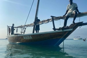 Excursión de un día a la isla de Mnemba con almuerzo a base de barbacoa y marisco