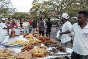 Street food market walking tour in Stone town with transfer