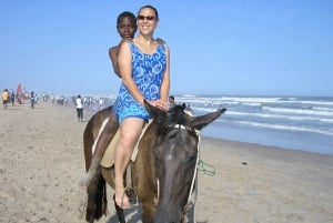 Nuotare con il cavallo, in spiaggia ( da nungwi)