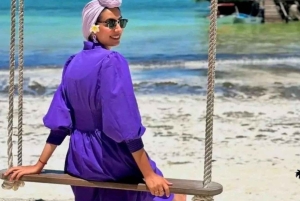 ZANZIBAR: Fangeøya, grottesvømming og den blå lagunen