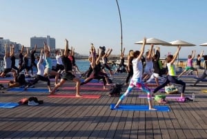 Tel Aviv: Beachfront Sunset Yoga at Beach Club TLV