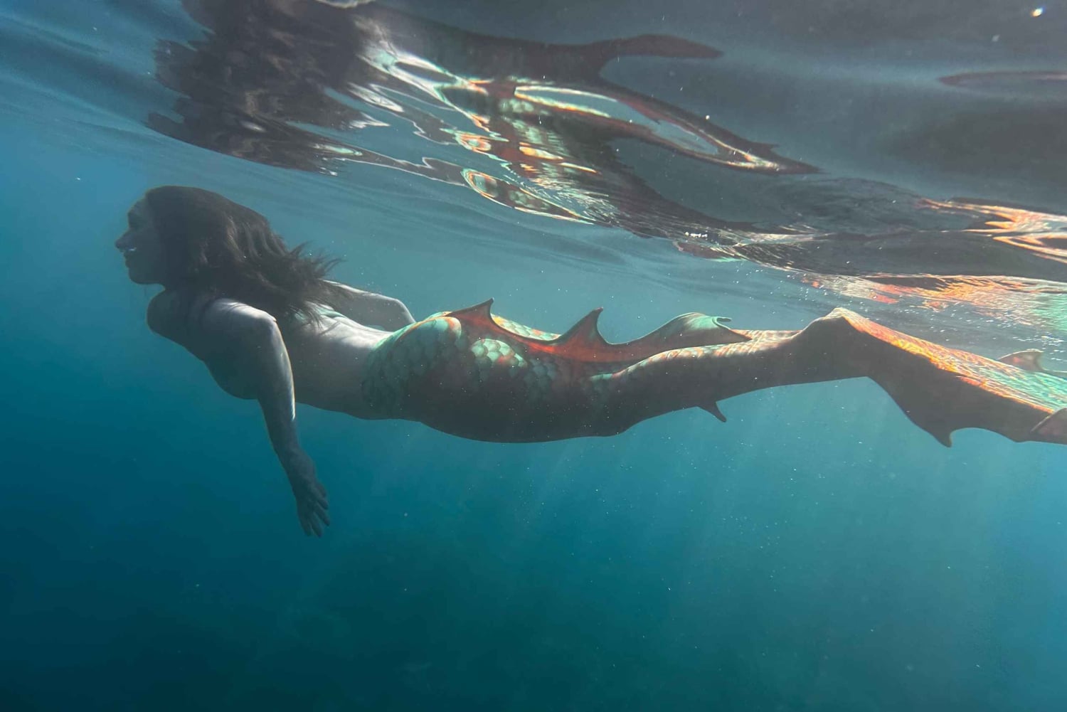 Experiencia de sirena y sesión fotográfica, incluyendo maquillaje.