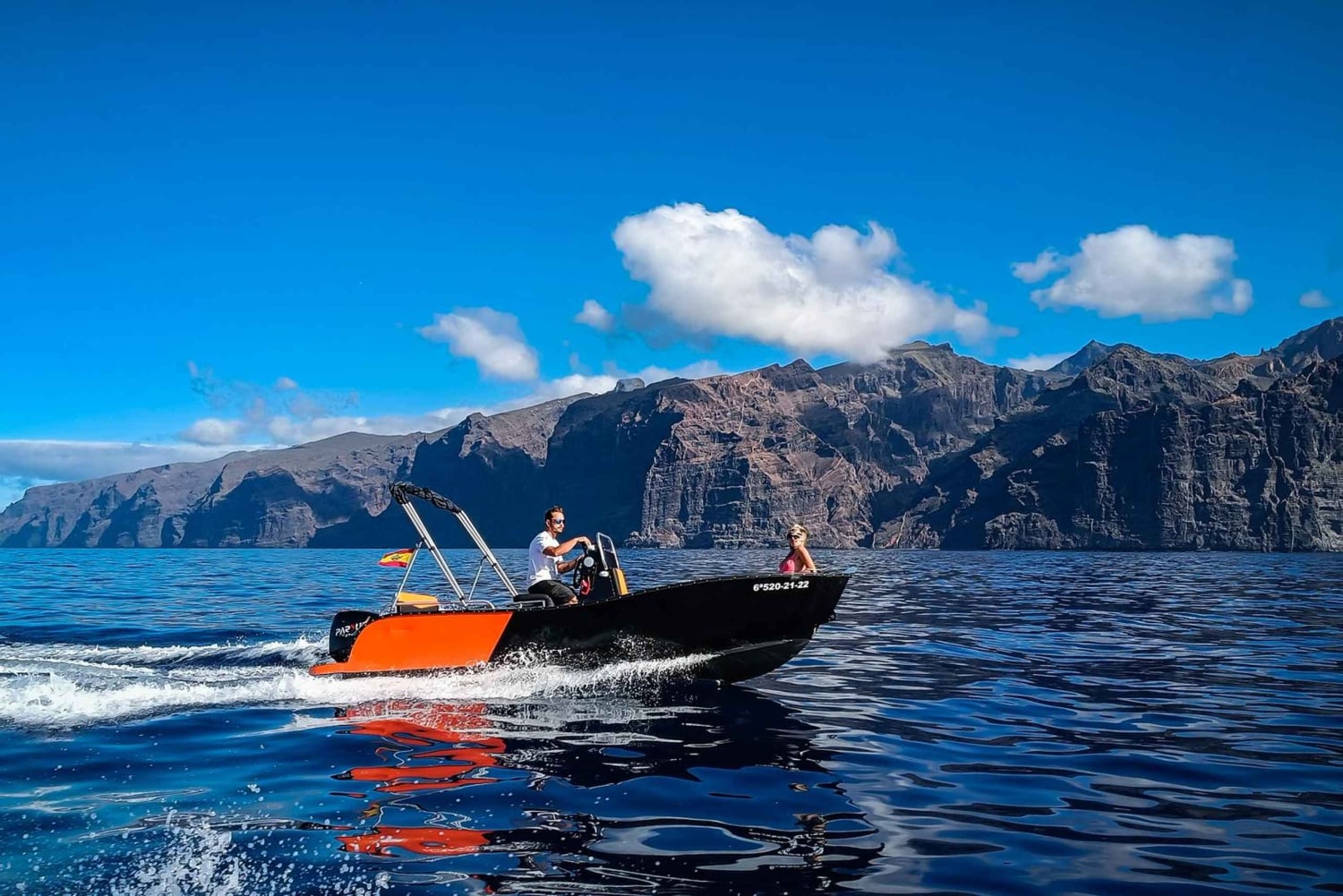 Tenerife: Discover Los Gigantes While Navigating a Boat