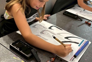 Kalligrafi & tryck din kalligrafi på en T-shirt.