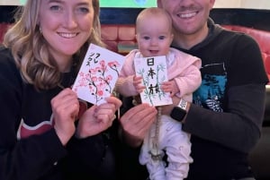 Tokyo: Kalligrafi på kanji-fläkt och rulle med dryck