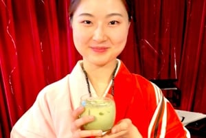 Tokyo: Kalligrafi på kanji-fläkt och rulle med dryck