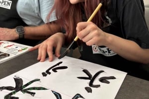 Calligraphiez et imprimez votre calligraphie sur un t-shirt.