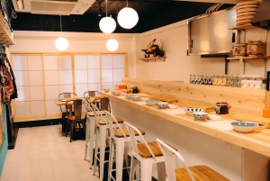 Tokyo : cours de préparation de sushis en veste happi près d'un site célèbre