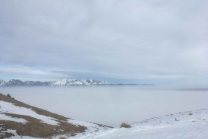 Sunset and night winter hike between Dolomites and Venice
