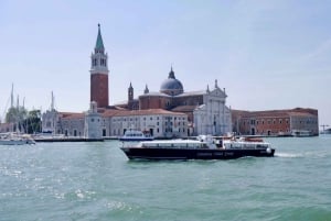 Privater Transfer vom Bahnhof nach San Marco und mehrsprachiger Guide