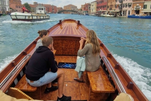 travel through time in Murano with a historic Venetian boat