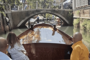 travel through time in Murano with a historic Venetian boat