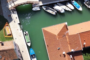 travel through time in Murano with a historic Venetian boat