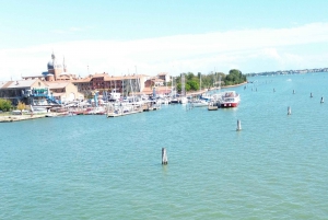 travel through time in Murano with a historic Venetian boat