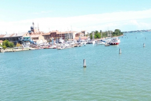 travel through time in Murano with a historic Venetian boat