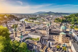 From Vienna: Day tour to Hallstatt and Salzburg & Boat ride