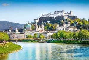 From Vienna: Day tour to Hallstatt and Salzburg & Boat ride