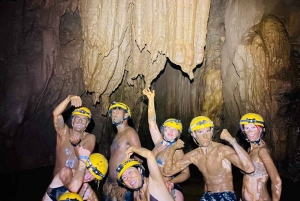 From Hue: Paradise Cave and Dark Cave Day Tour
