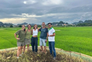 From Ninh Binh: Sunset tour: motorbike, tour guide, tickets