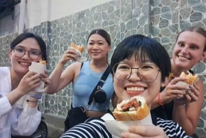 Ho Chi Minh City: Tour gastronomico in scooter con undici degustazioni
