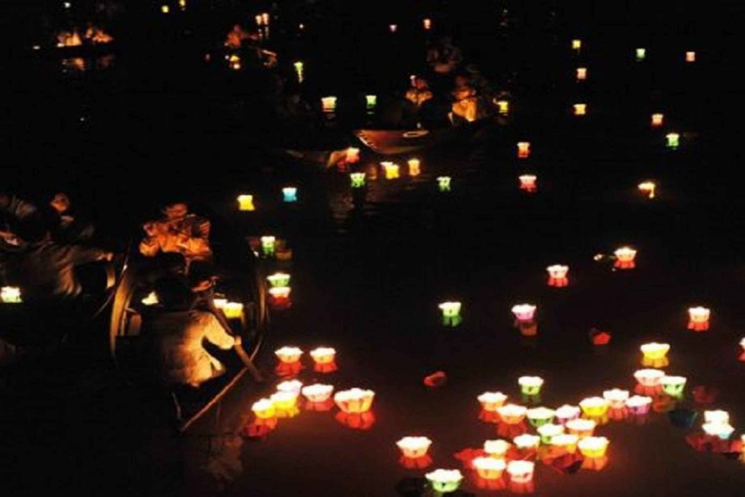River Boat Ride by Night with Drop Flower Lantern in Hoi An
