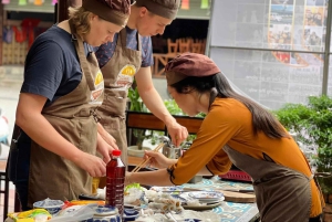 Hue City: Cyclo, Market Tour & Cooking Class at Madam Thu