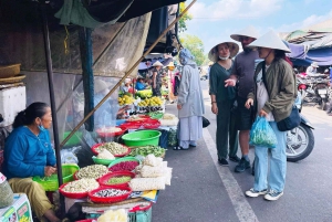 Hue City: Cyclo, Market Tour & Cooking Class at Madam Thu