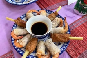 Clase de cocina en una casa con jardín y paseo en bici por el campo en Hue