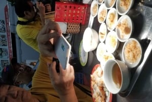 Hue: Night Street Food Tour by Cyclo with a Local Guide