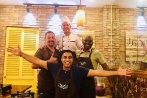 Corso di cucina immersivo e tour del mercato con chef locale + ricettario